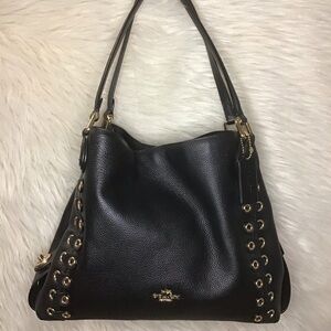 Coach Edie eyelet grommet shoulder bag black leather